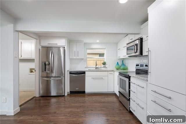 Newly Renovated Kitchen with Stainless Steel Appliances and Granite Countertops