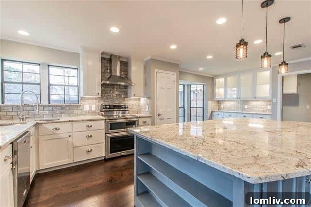 Open concept living room with large windows in remodeled Sunnyvale home