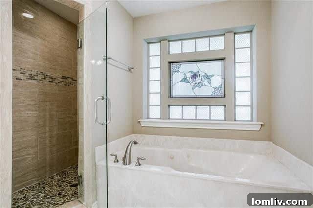 Bright bathroom with updated vanity and fixtures