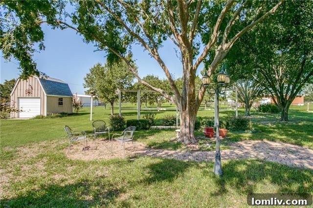 Expansive backyard with mature trees in 211 E. Fork Road Sunnyvale