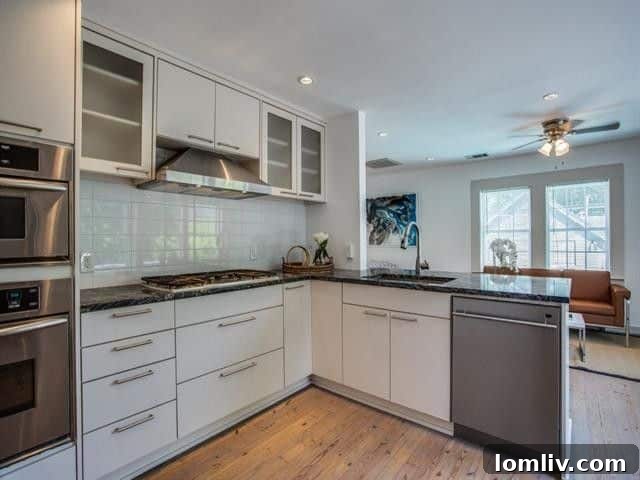 Lakewood Tudor's Modern Renaissance 22 Full kitchen within the guest quarters above the garage