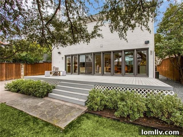 Lakewood Tudor's Modern Renaissance 26 Charming backyard with space for relaxation and entertaining