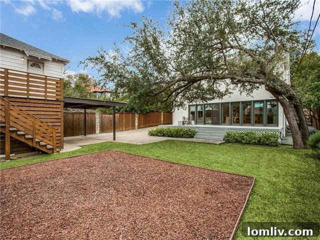Lakewood Tudor's Modern Renaissance 27 Path leading to the front entrance of the Tudor residence
