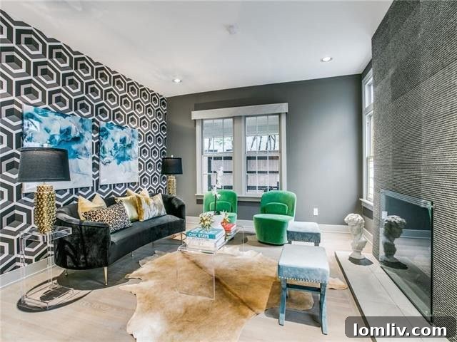 Lakewood Tudor's Modern Renaissance 5 Luxurious dining room with contemporary lighting and art