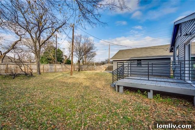 Large Backyard Deck Overlooking Green Space