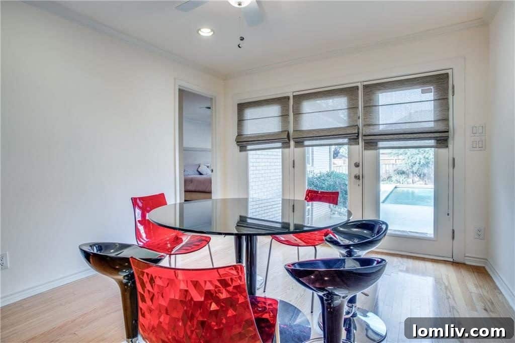 Gourmet kitchen featuring glass-front cabinets, granite countertops, and stainless steel appliances