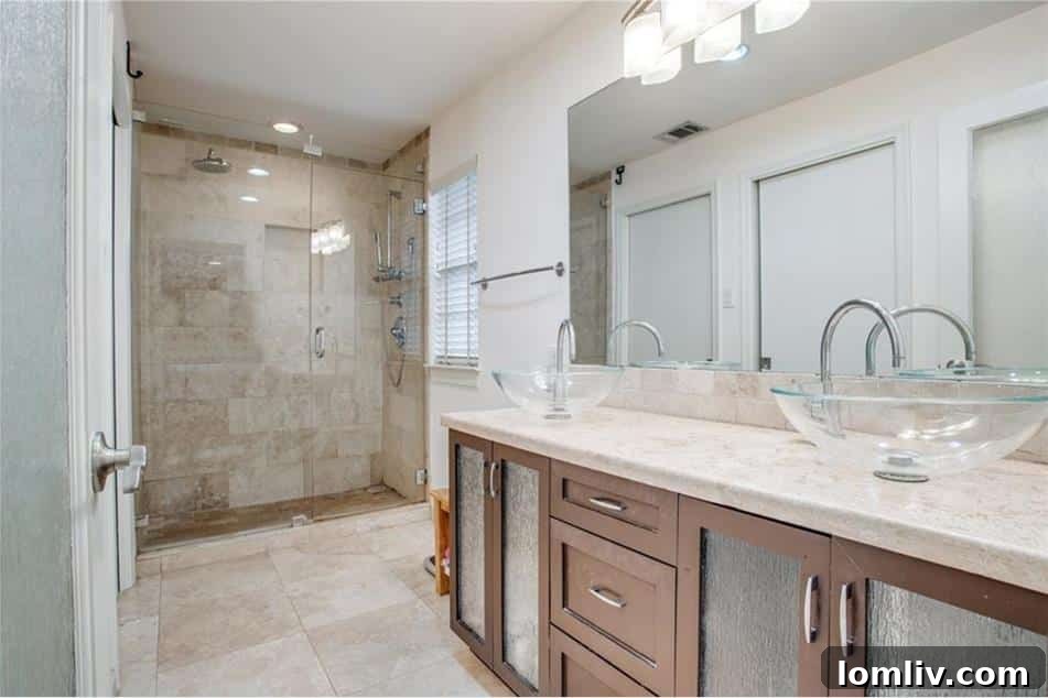 Luxurious master bedroom with hardwood floors, fresh paint, and crown molding