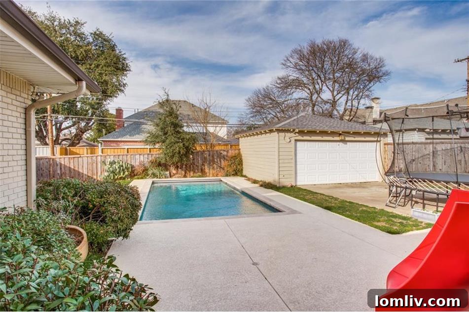 French doors from the master bedroom leading to the private backyard and pool area
