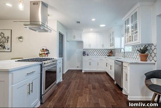 After renovation gourmet kitchen with quartz counters and island cooktop