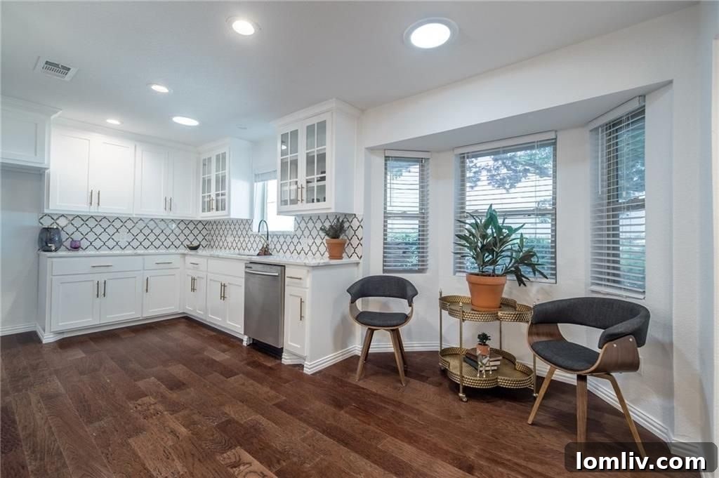 After renovation breakfast nook with modern seating and natural light