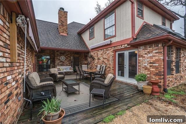 Lush, landscaped backyard offering privacy and a serene escape at 829 Shady Lake Drive, Bedford, TX.
