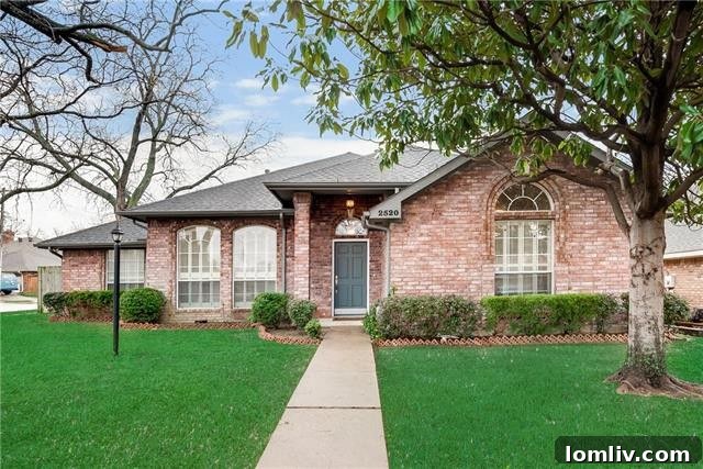 Charming exterior of the 3-bedroom home at 2520 Classic Court W, Bedford, TX, located on a desirable corner lot.