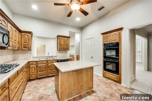 Elegant dining area adjacent to the kitchen at 2520 Classic Court W, Bedford, TX.