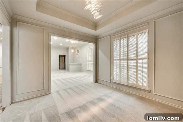Modern kitchen featuring granite countertops, double ovens, and extensive cabinetry at 2520 Classic Court W, Bedford.