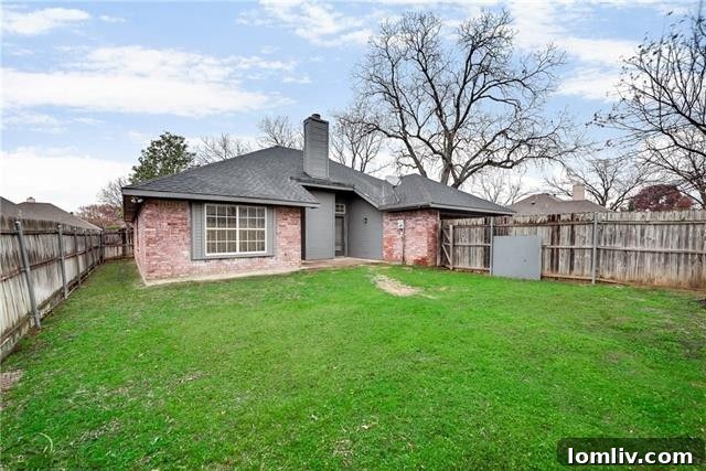 Well-maintained backyard offering a private outdoor space at 2520 Classic Court W, Bedford.