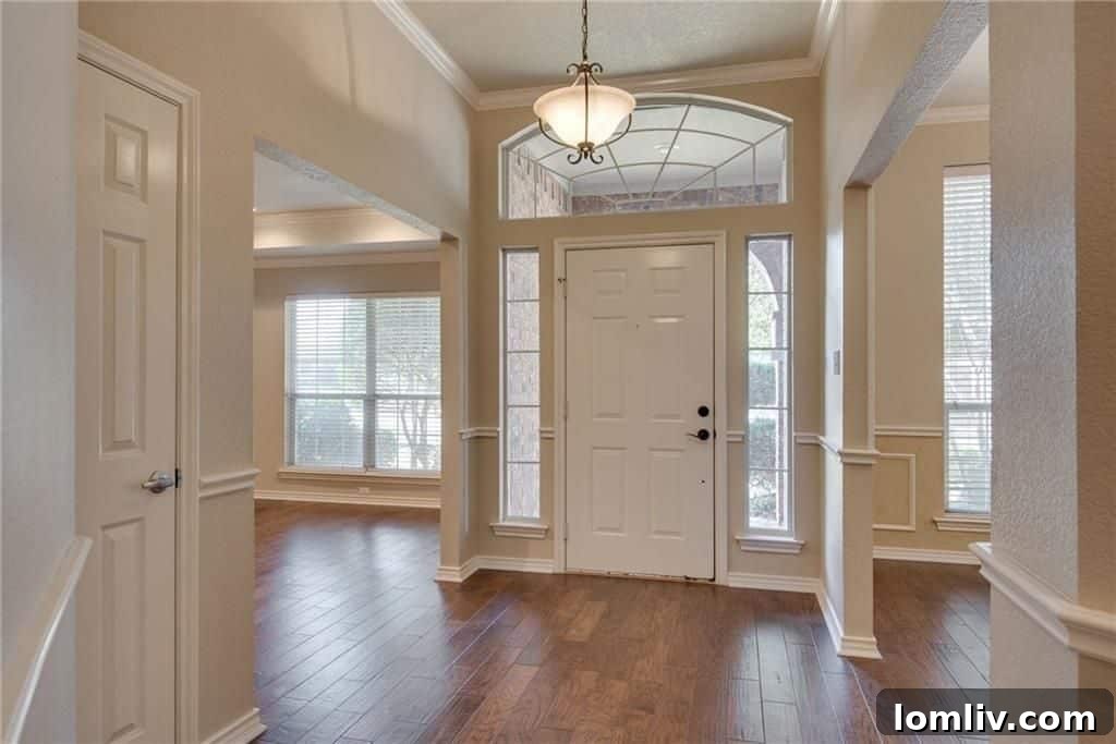 Modern kitchen with granite countertops and stainless steel appliances at 3101 Andrew Court, Bedford, TX.