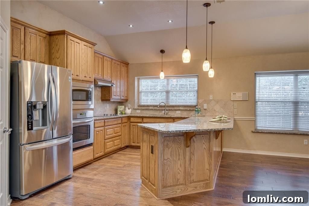 Luxurious master bathroom with separate vanities, a garden tub, and a walk-in shower at 3101 Andrew Court, Bedford, Texas.