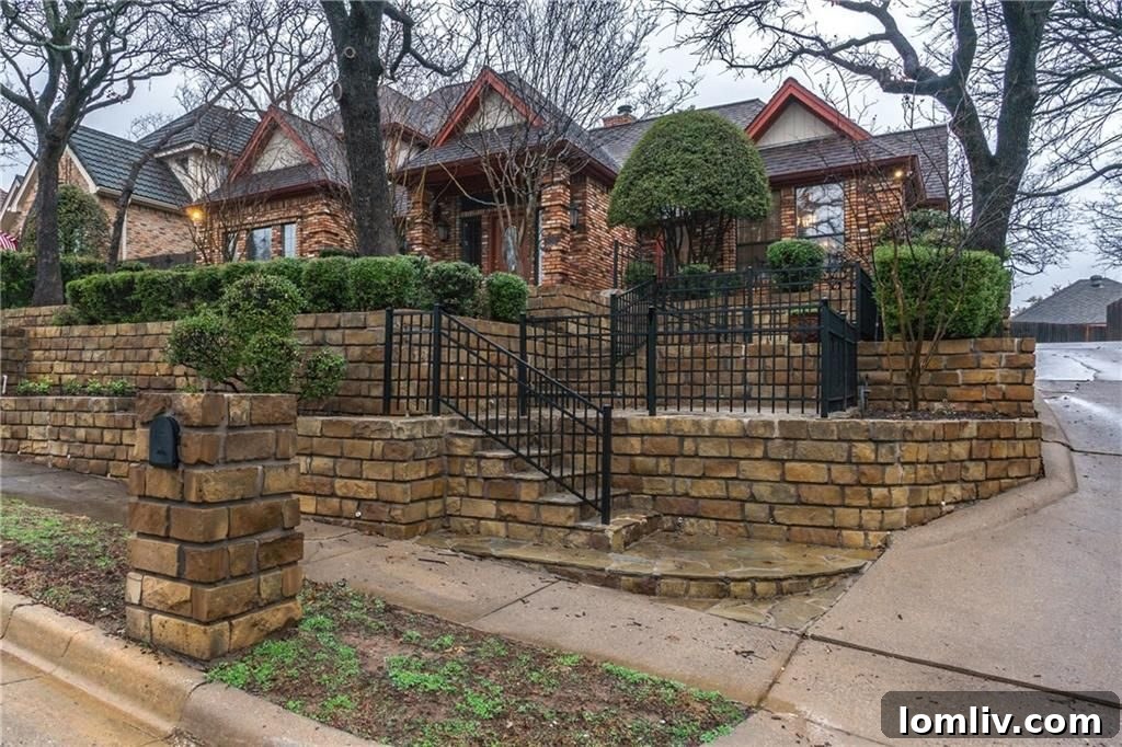 Charming curb appeal with landscaped garden steps leading to the front door of 829 Shady Lake Drive, Bedford, TX.