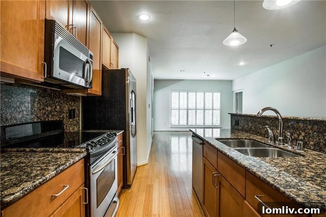 Low-Rise Living: Elevated Lifestyle, Grounded Costs 4 Open concept living and dining area in 4122 Avondale Unit 201