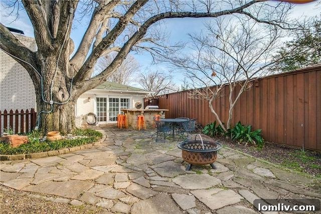 Lush landscaping and ample space for entertaining in the private backyard