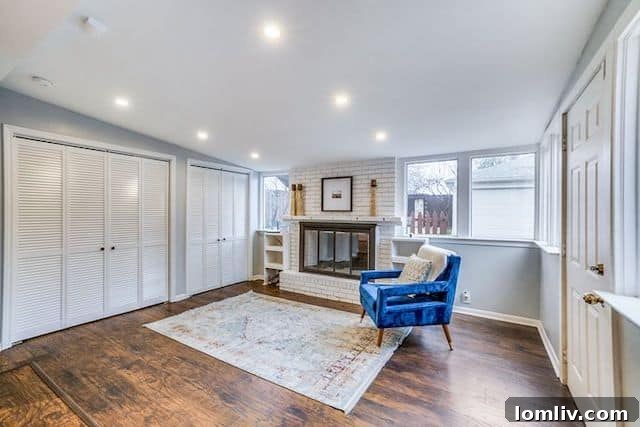 Bright and airy living room with hardwood floors at 10111 Champa Drive