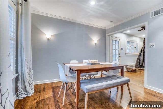 Hallway leading to bedrooms with elegant hardwood flooring