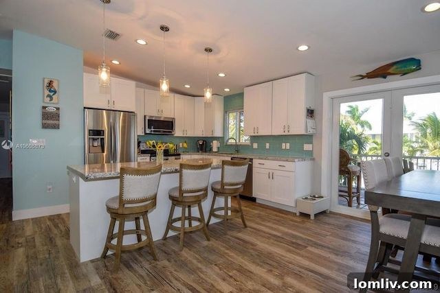 Panoramic view of a serene Key Largo canal with lush vegetation