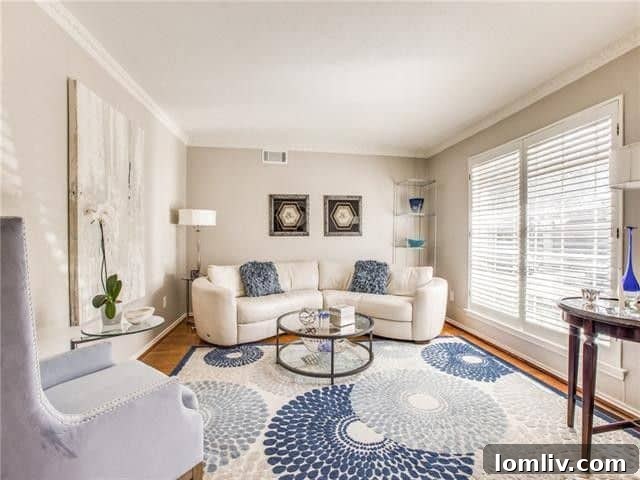 Gourmet kitchen with sleek granite countertops, stainless steel appliances, and a wet bar with a wine fridge in the Glen Meadows home.