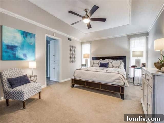 Spacious master bedroom with a comfortable sitting area and abundant natural light in 4123 High Summit Drive.