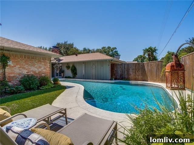 Elegant master bathroom featuring double sinks, a spacious vanity, and modern fixtures.