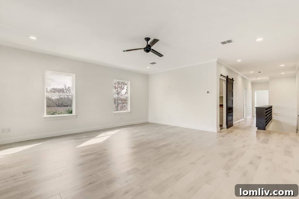 Spacious upstairs living area, perfect for media room or second living room in Fort Worth townhome
