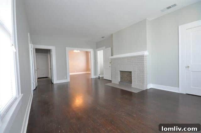 Spacious Living Room with Hardwood Floors and Natural Light