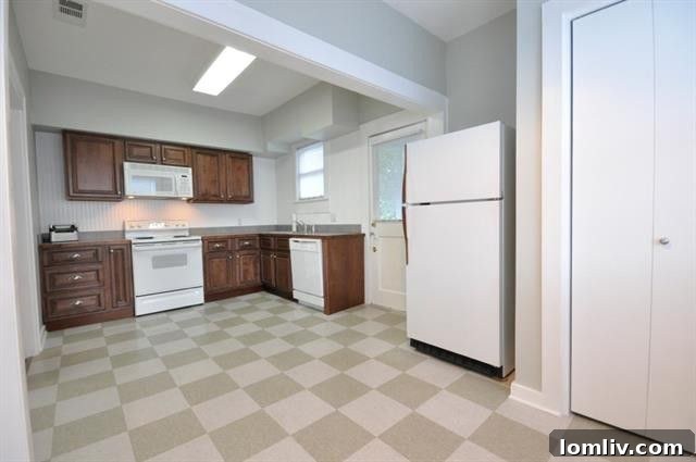 Spacious Kitchen and Dining Area with Ample Natural Light