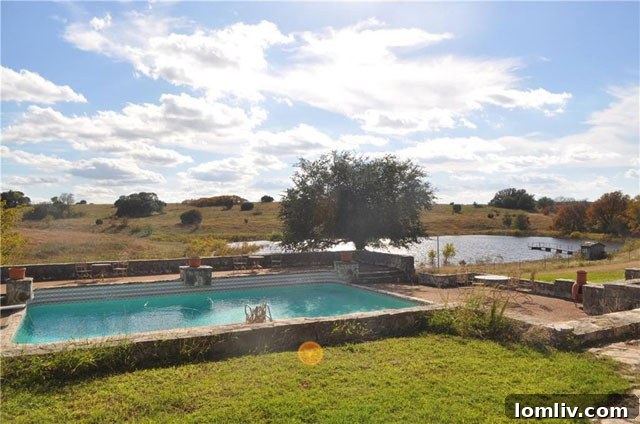 Modern kitchen with island in large Spanish style ranch house