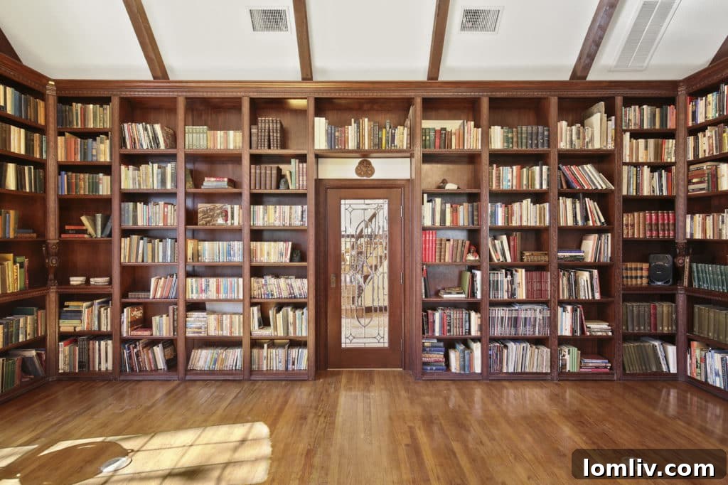 Serene garden pond reflecting the surrounding greenery, part of the extensive English gardens