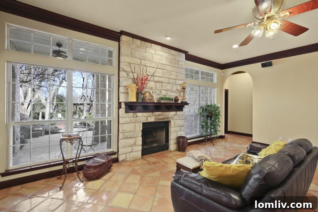 Inviting patio area surrounded by greenery, perfect for outdoor dining and entertaining