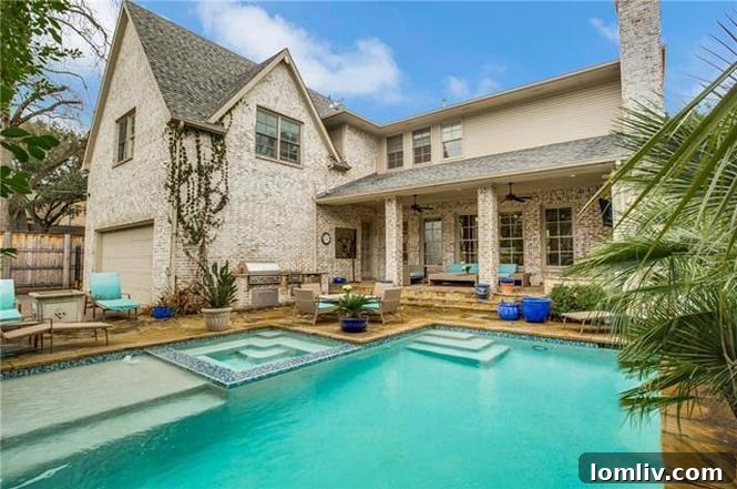 Heated saltwater pool with spa and water feature