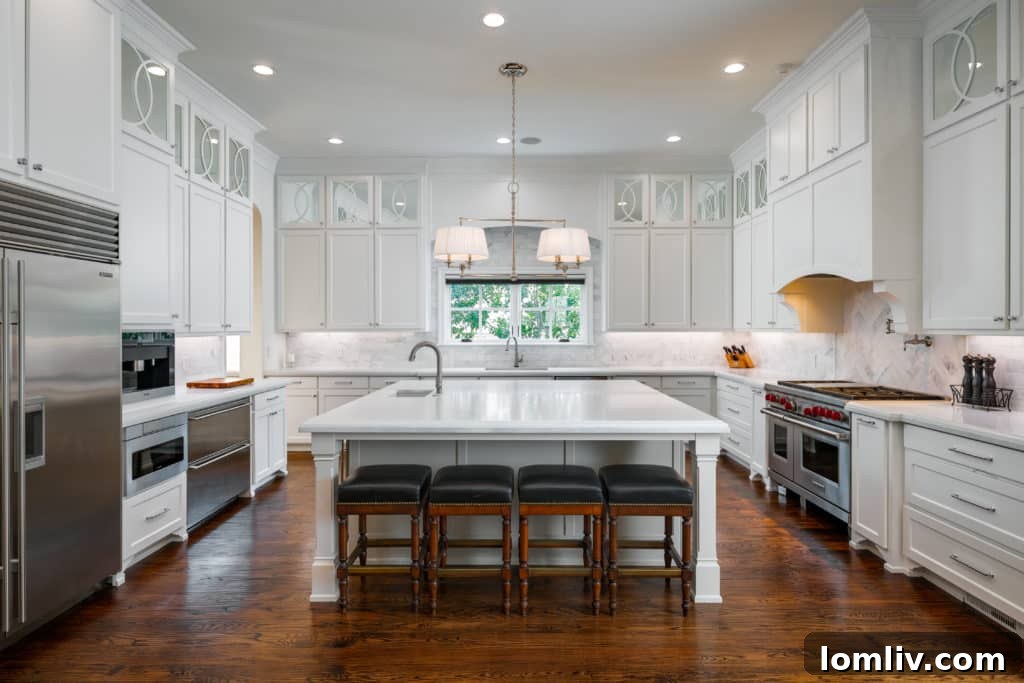 Gourmet Kitchen with Marble Island and Dining Area in a Luxury Dallas Home