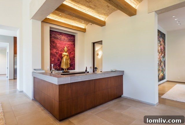Custom bar featuring Rhodes Architectural Stone countertop in a luxury Dallas home