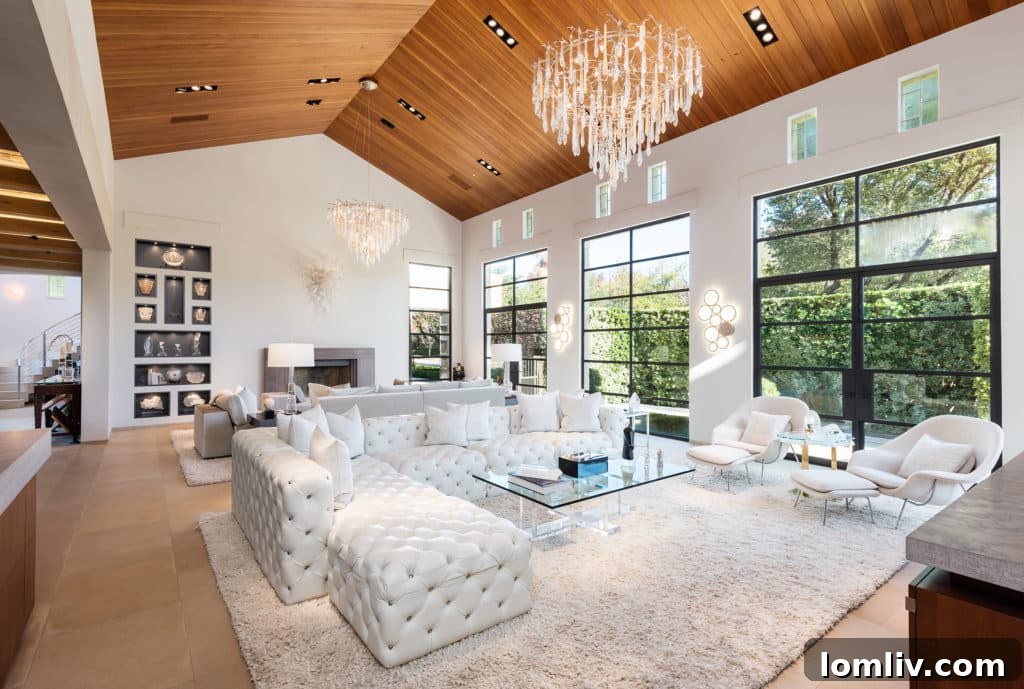 Spacious great room with high vaulted ceilings and natural light