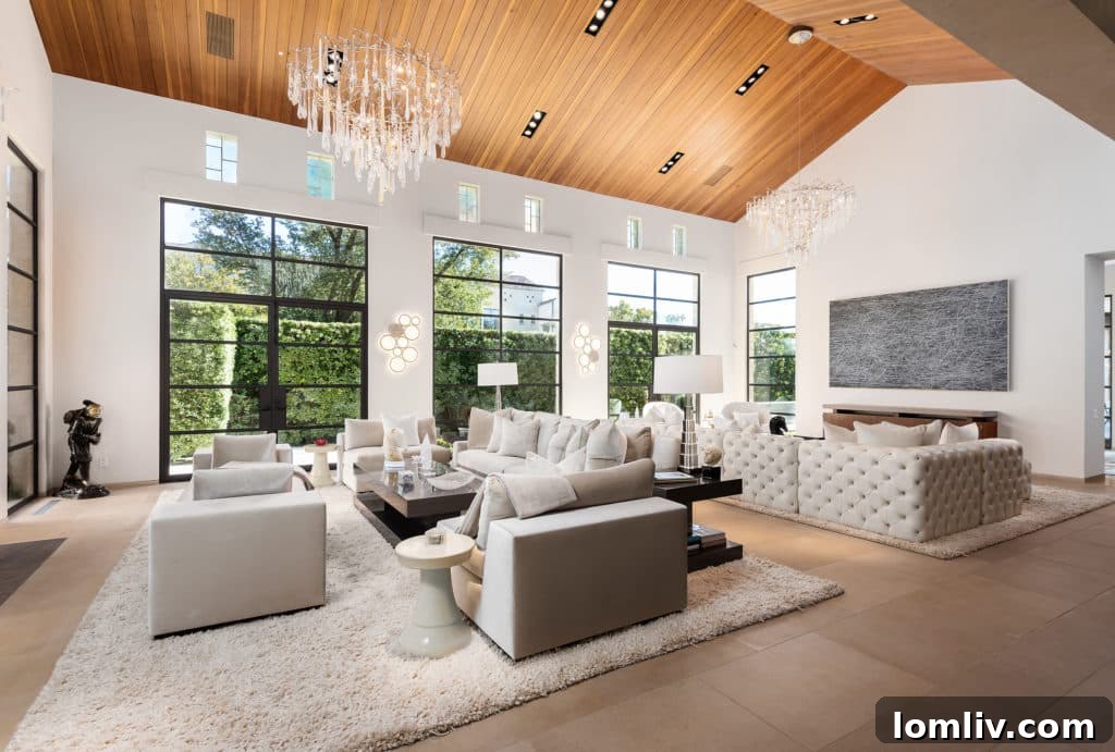 Highland Park luxury home dining area with elegant chandelier and outdoor views