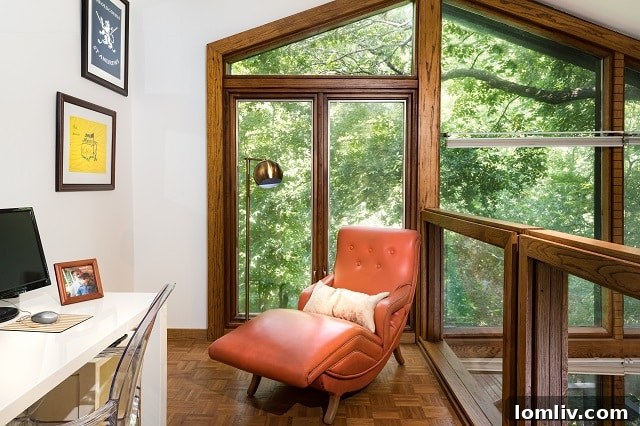 Unique second-story loft in one of the secondary bedrooms with parquet wood flooring