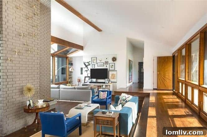 Expansive glass window walls bringing nature indoors at 6933 Delrose Drive