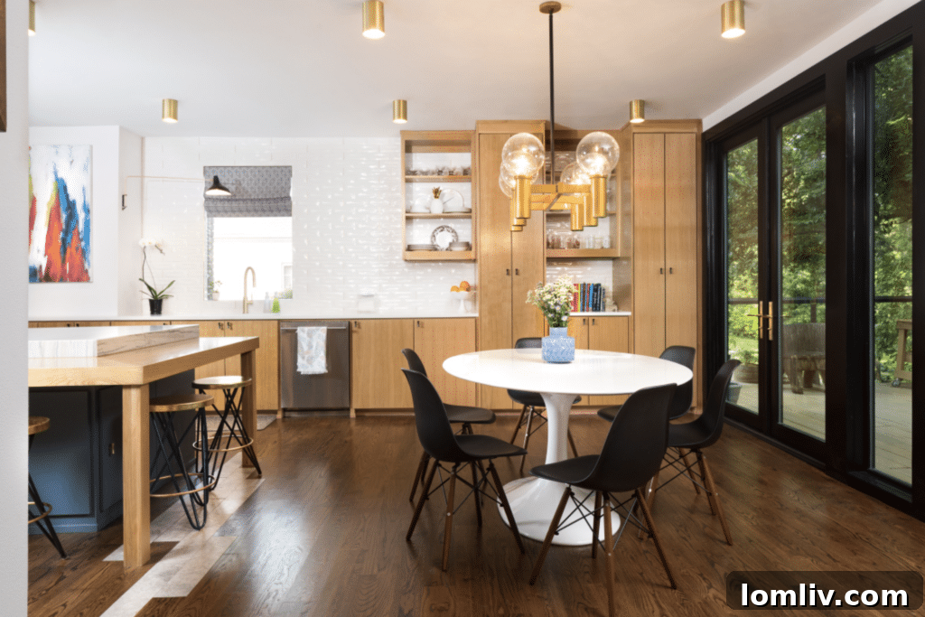 Modern gourmet kitchen with rift-cut white oak cabinets, quartzite island, and an innovative grow wall