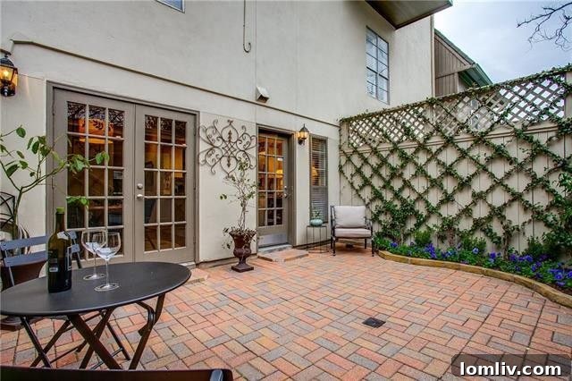 Luxurious master bathroom with dual vanities and contemporary fixtures in the Perry Heights condo
