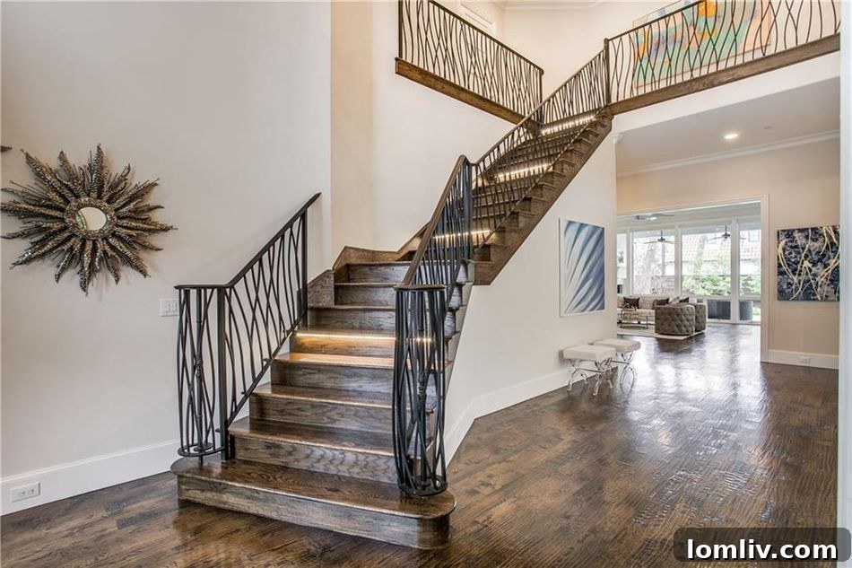 Grand entry hall with soaring ceilings and natural light