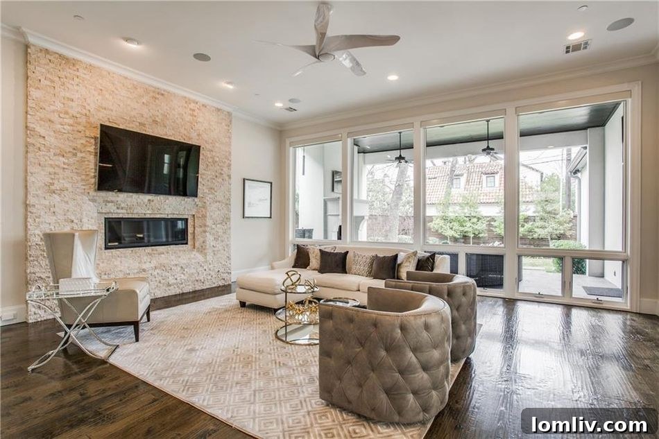 Open concept living area with fireplace and contemporary design