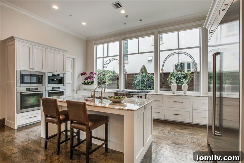 Gourmet kitchen with marble countertops and high-end appliances