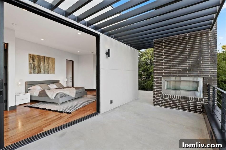 Luxurious master bedroom with private terrace and fireplace