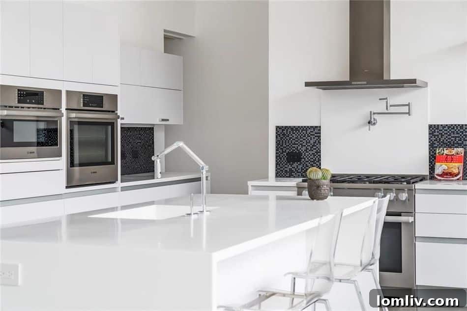 European kitchen with Miele range and large Krion island